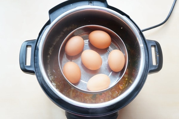 Egg curry made by adding boiled eggs to a spicy curry sauce, along with coconut milk to balance the flavors. In this Instant Pot Egg Curry, we will make the curry sauce and boil the eggs together. Make this delicious Egg Curry for dinner in under 30 minutes | #eggcurry #instantpot #pressurecooker #eggs #curry #lowcarb #glutenfree | pipingpotcurry.com