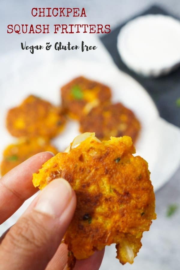Try these super delicious and crunchy Chickpea Squash Fritters. These vegan & gluten free Chickpea Squash Fritters are so easy and take less than 30 minutes to make! Vegan Chickpea Squash Fritters - Closeup