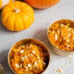 Coconut Pumpkin Halwa, also called as Kaddu ka Halwa is an Indian pumpkin dessert made with pumpkin, sugar, ghee, coconut and nuts. It can be cooked in a pressure cooker on the stovetop or Instant pot and takes less than 30 minutes to make this delicious dessert! #pumpkinhalwa #pumpkinpudding | pipingpotcurry.com