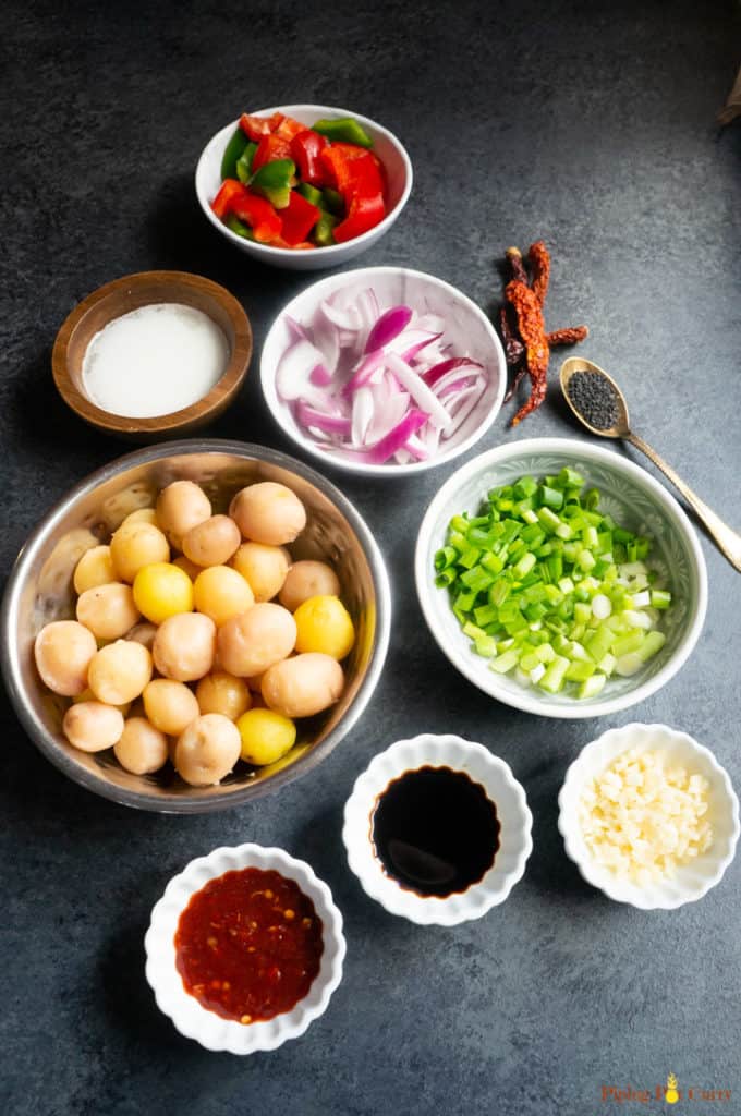Flavorful and easy Garlic Chili Potatoes, made with steamed potatoes, garlic, chili sauce and honey, sprinkled with green onions and sesame seeds. Enjoy them as an appetizer or side! Ingredients to make garlic chili potatoes