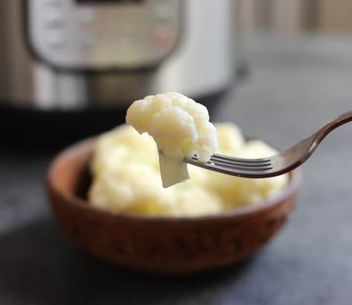 Easy, tasty & low carb Steamed Cauliflower made in the Instant Pot in less than 15 minutes! #cauliflower #instantpot #pressurecooker #pipingpotcurry | pipingpotcurry.com Perfectly Steamed Cauliflower in the Instant Pot