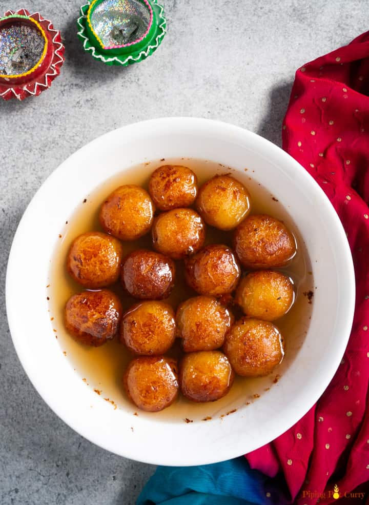 Khoya Gluab Jamun fried and dipped in sweet syrup
