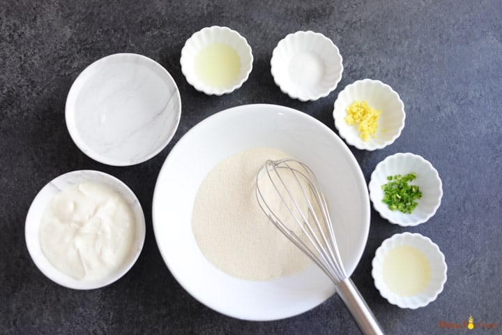 Ingredients to make Rava Dhokla in bowls